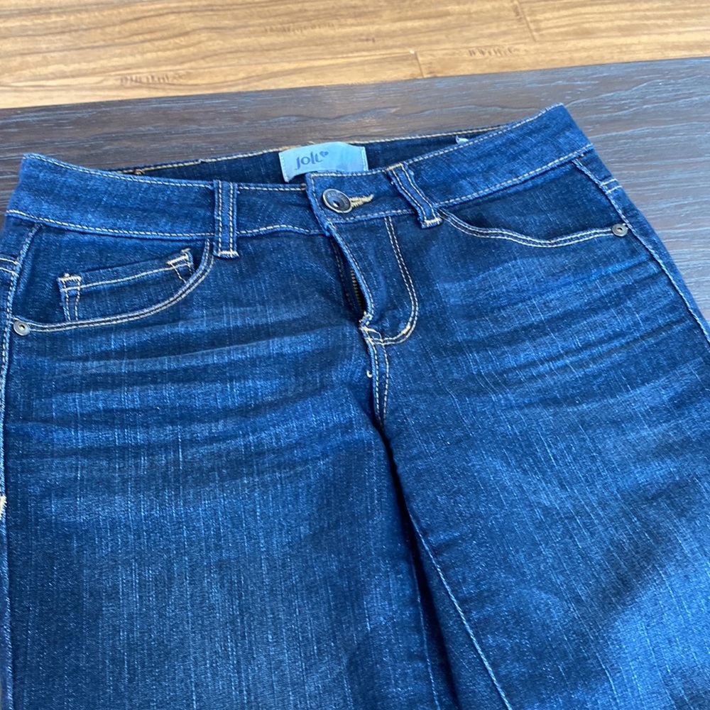 Jolt ladies denim in size 3. 31 inch inseam with slight distressing.